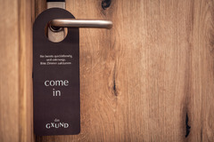Türschild an der Türklinke Hotelzimmer das GXUND