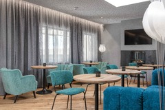 Hoteleigenes À la carte Restaurant unGXUND Ansicht Lounge